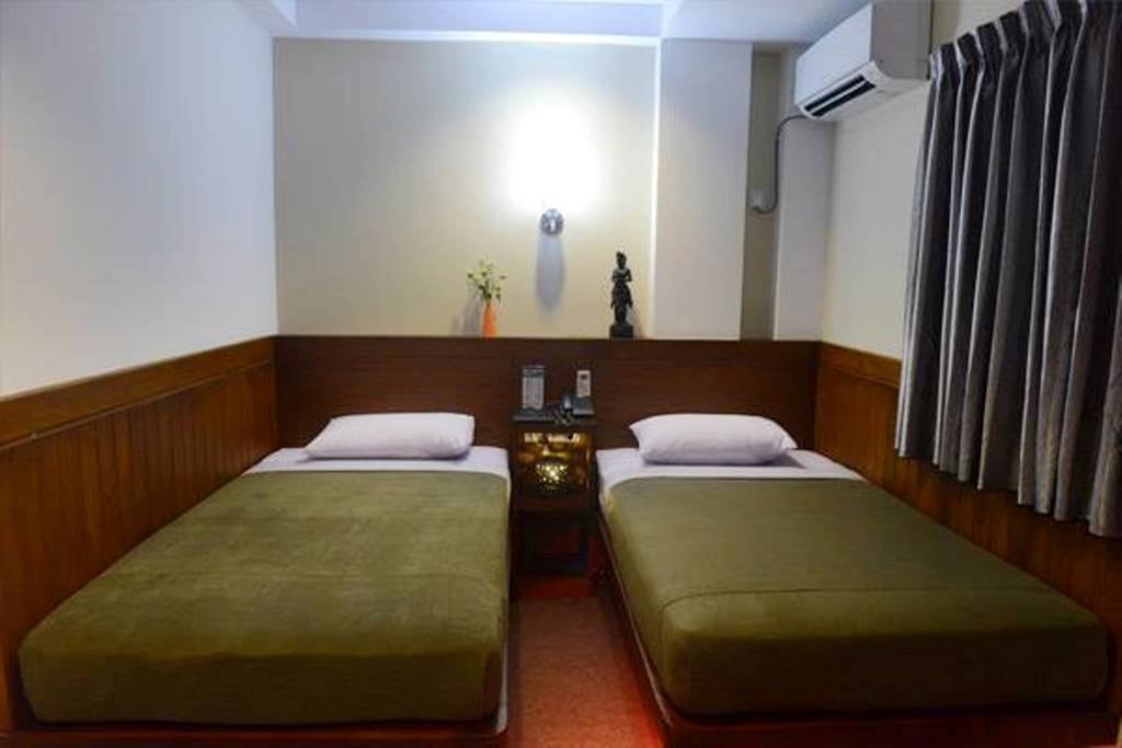 Green Paradise Hotel Yangon Ruang foto